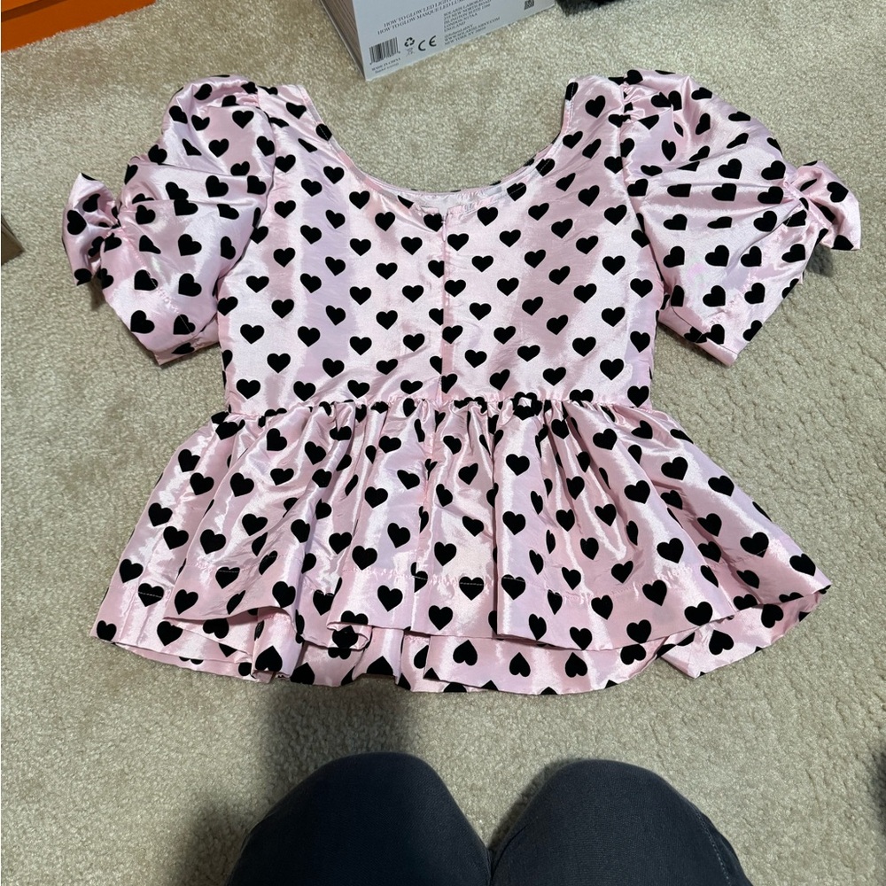 LoveShackFancy pink blouse with black hearts
